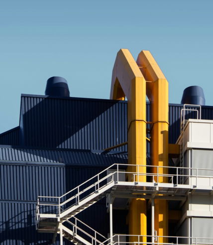 yellow-and-black-factory-during-daytime.jpg yellow and black factory during daytime