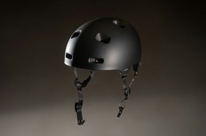 a-black-helmet-with-holes-on-the-side-of-it.jpg a black helmet with holes on the side of it